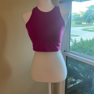 A pink athleta tank top